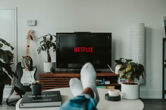 black flat screen tv indoor aktivitäten turned on displaying 11